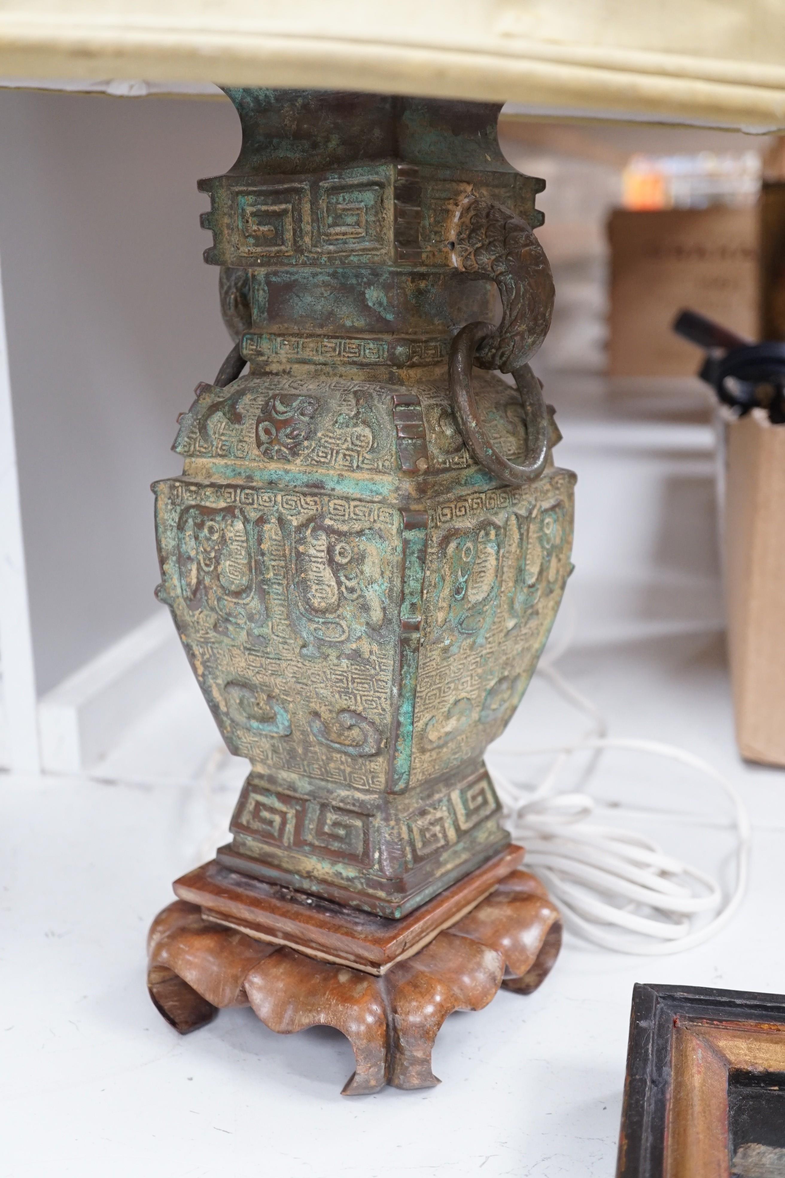 A pair of 20th century Chinese archaistic design bronze table lamps height to top of vase 37 cm